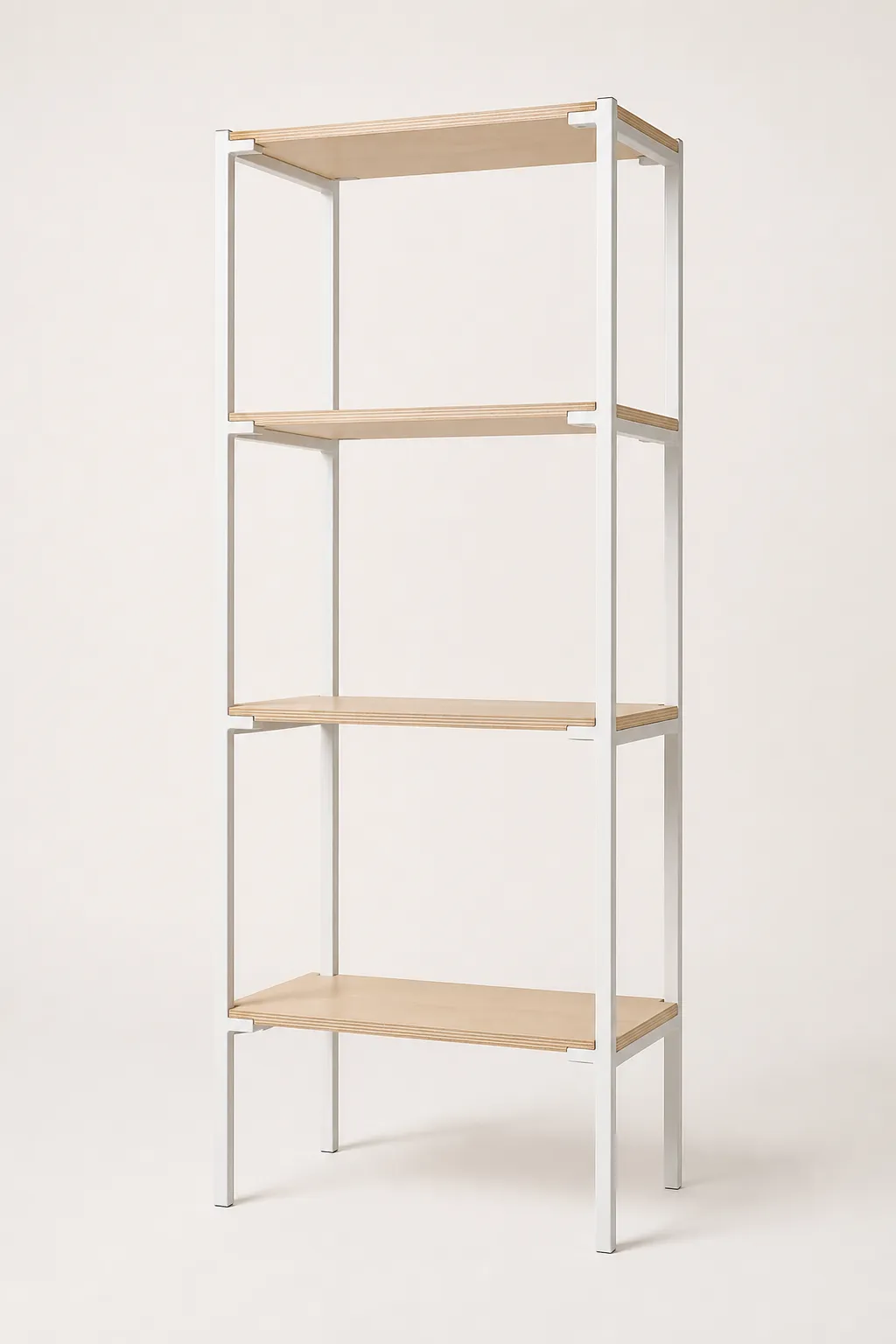 A tall modular shelving unit with white steel uprights and four empty birch plywood shelves